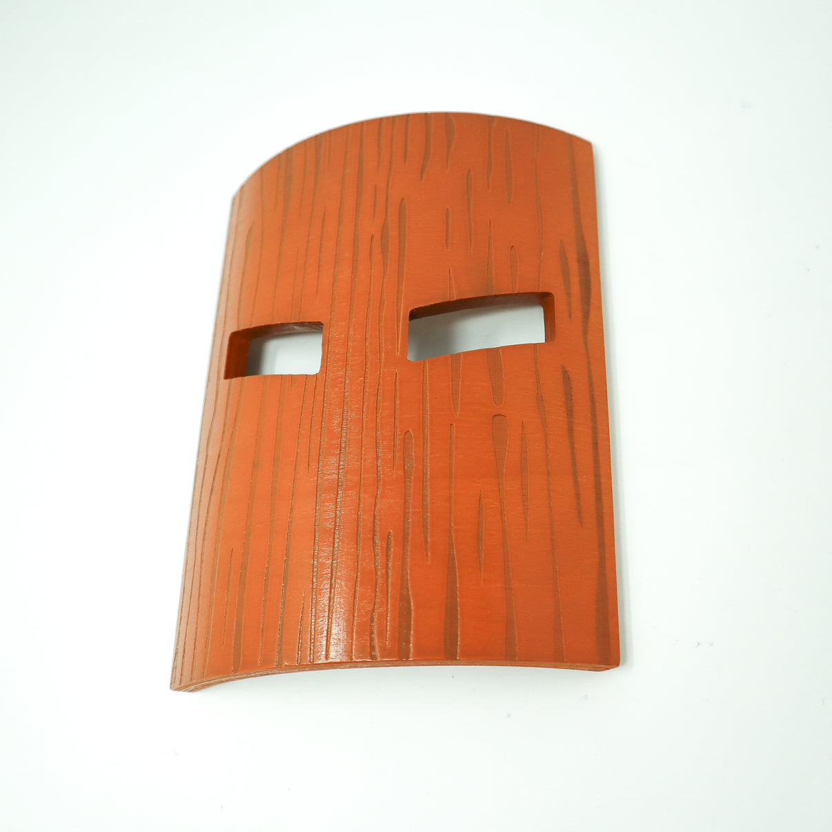 A photo of the Fool's Gold wooden mask.